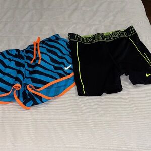 Nike Women's Blue & Black Athletic Shorts with Orange Trim